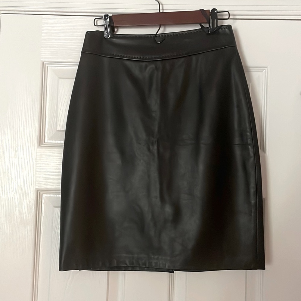 Elie Tahari, leather pencil skirt, over the knees.
